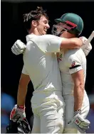  ?? PHOTO: GETTY IMAGES ?? Australia’s Mitchell Marsh celebrates with his brother Shaun Marsh after scoring a century during day four of the fifth test match in Sydney yesterday.