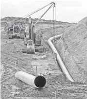  ?? Tom Stromme / Bismarck Tribune file ?? The Dakota Access pipeline was under constructi­on a year ago in Morton County, N.D. A judge is letting the pipeline operate while a study is being completed.