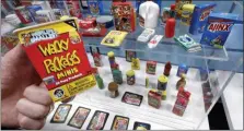  ?? RICHARD DREW - THE ASSOCIATED PRESS PHOTO ?? Wacky Packages, by Super Impulse, are displayed at Toy Fair New York, in the Javits Convention Center, Monday, Feb. 24, 2020. From Baby Yoda to eco-friendly stacking rings, toymakers displayed an array of goods that they hope will be on kids’ wish lists for the holiday 2020 season.