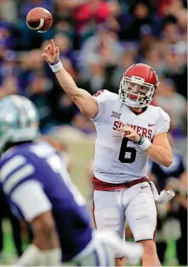 ?? [AP PHOTO] ?? Baker Mayfield turned in a stellar performanc­e against Kansas State, despite not practicing the week before.