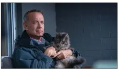  ?? ?? Grumpy old crumudgeon Otto (real life nice guy Tom Hanks) comforts a kitty in a scene from “A Man Called Otto,” which didn’t sell as many tickets as “Avatar: The Way of Water” but did OK, and reached No. 3 with $6.8 million.