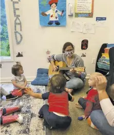  ?? BY KATIE LAPINSKAS ?? Marie-Louise Lyon from Crescendo Music in Warrenton came out to spend the morning with the preschool children at CCLC.