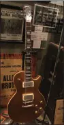  ?? (The Atlanta Journal-Constituti­on/Melissa Ruggieri) ?? This 1957 Gibson guitar, a Les Paul Goldtop, was used by Duane Allman on the band’s first two albums and, most famously, on the Derek and the Dominoes recording of “Layla.”