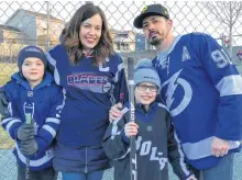  ?? SUBMITTED ?? Nicolle and Scott Howell, with their sons Aaron and Clark, proudly wear their hockey jerseys for an April 12, 2018 photo taken during a tribute in Mount Pearl to the Humboldt Bronos hockey team.