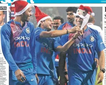  ?? AP PHOTO ?? Kuldeep Yadav (centre) shares a light moment with MS Dhoni after the final T20 game in Mumbai.