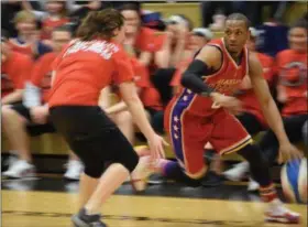  ?? MARIAN DENNIS — MEDIANEWS GROUP ?? Faculty from Boyertown schools gave it their all as they played against the Harlem Wizards at Boyertown Area High School to raise money for the Foundation for Boyertown Education.