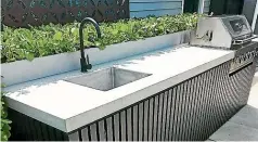  ?? ?? An outdoor kitchen benchtop (bespokecon­cretedesig­n.co.nz).