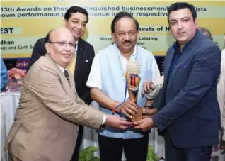  ??  ?? Vineet Chadha, Managing Director, Combined Logistics Solutions Pvt Ltd was conferred the award by Dr. Harsh Vardhan