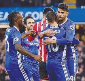  ??  ?? Hazard e Diego Costa voltaram a ser decisivos no Chelsea