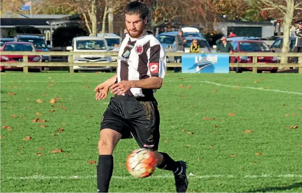  ??  ?? Gary Dobson was part of the Waikato Stud Matamata Swifts back four that performed well during his team’s 2-1 win at Cambridge.