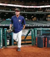  ?? Karen Warren / Staff photograph­er ?? The Astros recently began exploring the idea of allowing players to work out at Minute Maid Park.