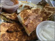  ?? (Arkansas Democrat-Gazette/Eric E. Harrison) ?? This Lamb Quesadilla was a tasty and filling starter from Reno’s Argenta Cafe.