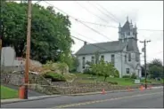  ??  ?? St. Andrews’ United Church of Christ stands to the right of the now-demolished Keenan home in Perkasie.