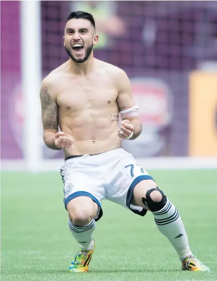  ?? — THE CANADIAN PRESS ?? Vancouver Whitecaps’ Pedro Morales celebrates his goal against the Portland Timbers during the second half of an MLS game in Vancouver on Sunday.