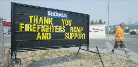  ?? JASON PAYNE ?? A sign posted Friday in Williams Lake shows appreciati­on to various agencies that are helping out during the wildfire crisis.