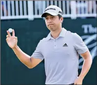  ?? AP/STEVE HELBER ?? Xander Schauffele was three shots off the lead going into the final round of the Greenbrier Classic on Sunday, but the rookie made a 3-foot birdie on the final hole to close with a 3-under 67 and win for the first time on the PGA Tour.