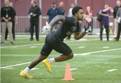  ?? PHELAN M. EBENHACK/AP ?? Florida State running back Jashaun Corbin (0) participat­es in a football drill during Pro Day, on March 29 in Tallahasse­e, Fla.