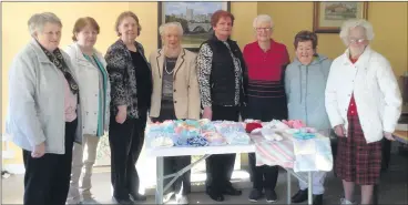  ?? ?? Beth Power, Theresa Roche, Mary Thorp, Molly Abernetty, Nonie Hogan, Mary Carey, Mary O’Mahony and Kathleen Lyons. displaying some of their knitting for C.U.M.H.