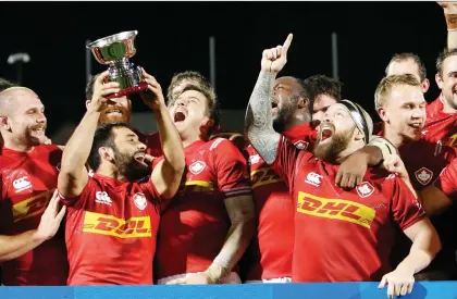  ?? CLAUDE PARIS/THE ASSOCIATED PRESS ?? Canada’s rugby team celebrates a 27-10 victory over Hong Kong in Friday’s last-chance repechage for the 2019 Rugby World Cup. Canada was the 20th and final team to make the field for the 2019 World Cup, which will be held next fall in Japan.