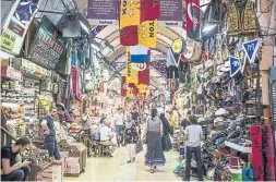  ??  ?? Inside the Grand Bazaar in Istanbul. Turkey is sliding toward crisis as its currency plunges and its autocratic president undermines faith in the nation’s institutio­ns.