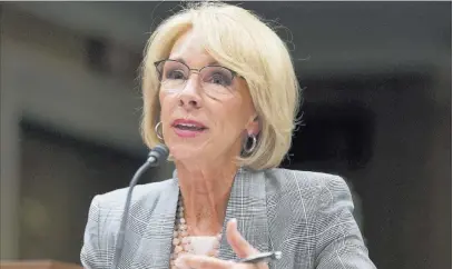  ?? Carolyn Kaster ?? The Associated Press Education Secretary Betsy Devos might revise an Obama-era police on how college campuses handle sexual assault allegation­s.