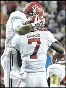  ?? HYOSUB SHIN / HSHIN@AJC.COM ?? Receiver Trevon Diggs and the Tide held their customary celebratio­n at the Georgia Dome.