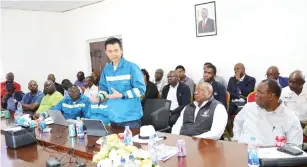  ?? ?? Dinson Iron and Steel chairman Mr Benson Xu addresses stakeholde­rs while Zimpapers chief executive Mr Pikirayi Deketeke (second from right) and other members listen during a tour of the company plant in Mvuma last Friday