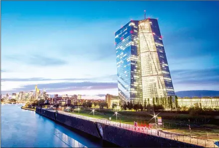  ??  ?? The European Central Bank is seen next to the river Main in Frankfurt, Germany, late Wednesday Oct 2. (AP)