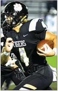  ?? (Courtesy photo/Jim Best) ?? Charleston’s Brevyn Ketter looks for running room in a game earlier this season. The Tigers will host Centerpoin­t on Friday in a Class 3A state playoff game at Alumni Field.