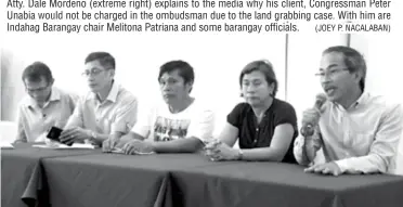  ?? (JOEY P. NACALABAN) ?? Atty. Dale Mordeno (extreme right) explains to the media why his client, Congressma­n Peter Unabia would not be charged in the ombudsman due to the land grabbing case. With him are Indahag Barangay chair Melitona Patriana and some barangay officials.