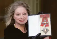  ?? Philip Toscano / Getty Images 2015 ?? Author Hilary Mantel was anointed Dame Commander, Order of the British Empire, by Prince Charles in 2015.