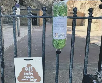  ??  ?? The poop bag holders have been placed near parks and beaches.