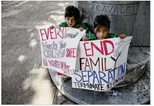  ?? PHOTOS BY RALPH BARRERA / AMERICAN-STATESMAN ?? Children outside the Williamson County Courthouse show their opposition to the detention center. Williamson County commission­ers voted Tuesday to terminate the county’s contracts with ICE andCoreCiv­ic at the center.