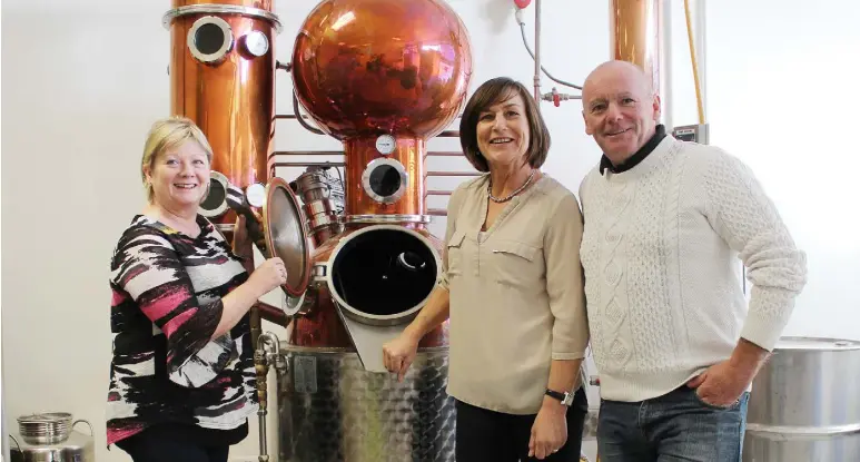  ??  ?? Eileen Brennan, Valerie Power and John Power of the Beara Distillery in Co Cork, which got a marketing boost when Graham Norton posted photos of their Beara Ocean Gin on Instagram