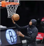  ?? KATHY WILLENS — THE ASSOCIATED PRESS ?? Brooklyn Nets forward Kevin Durant goes up for a shot during the first quarter of an NBA game Sunday in New York.