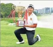  ?? ASIAN TOUR ?? Poom Saksansin poses with the trophy on Sunday.