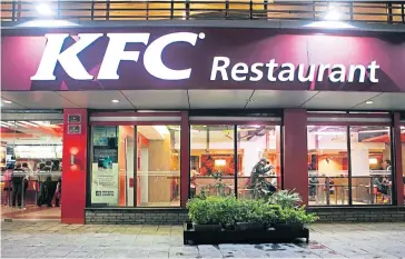  ?? BLOOMBERG ?? A file photo dated Dec 4, 2014 shows a KFC restaurant in the Durbar Marg area of Kathmandu.