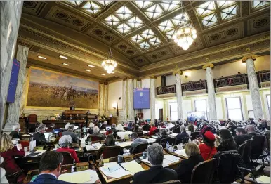  ?? THOM BRIDGE/INDEPENDEN­T RECORD VIA AP ?? The Montana House of Representa­tives holds a floor session in the State Capitol in Helena, Mont. on Jan. 25. Emboldened by a conservati­ve Supreme Court, Republican state lawmakers are rushing to enact abortion limits, including outright bans intended to test the landmark Roe v Wade decision. More abortion restrictio­ns already have been enacted into law than in any year but one over the last decade, and dozens of additional bills are working their way through GOP-controlled legislatur­es.