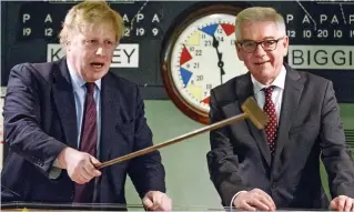  ??  ?? In the bunker: Boris Johnson with Polish minister czaputowic­z yesterday