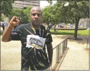  ?? (AP/Dylan Lovan) ?? Lavel White, a documentar­y filmmaker and a community activist, stands for a portrait near a protest gathering in downtown Louisville, Ky., on June 5. He was a junior in high school — living in public housing in a predominan­tly black, historical­ly impoverish­ed neighborho­od in Louisville — when he turned on the news and saw a police officer was acquitted for shooting a young black man in the back. Next time, he thought, it might be me.