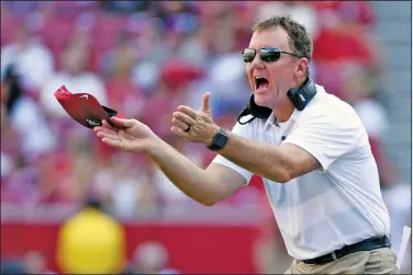  ?? Associated Press ?? Razorbacks aiming for rebound: In this Sept. 15, 2018, file photo, Arkansas coach Chad Morris reacts to a call in the first half of an NCAA college football game against North Texas in Fayettevil­le. The Razorbacks’ 2-10 record yielded the worst winning percentage and tied for the second lowest number of total wins in school history.