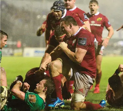  ??  ?? Connacht provided a tough test for Munster at the Sportsgrou­nd back in December and here Tommy O’Donnell celebrates with his Munster team-mates after Rhys Marshall scored their side’s opening try – tomorrow, the team will be looking for a repeat of...