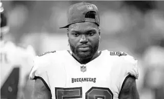  ?? ZACH BOLINGER/AP ?? Tampa Bay Buccaneers outside linebacker Shaquil Barrett walks on the sideline during a game against the Indianapol­is Colts on Nov. 28 in Indianapol­is.