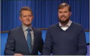  ?? SONY PICTURES — COURTESY PHOTO ?? Longmont resident Stephen Webb, right, pictured with ‘Jeopardy!’ host Ken Jennings, has won three games of the quiz show as of early March.