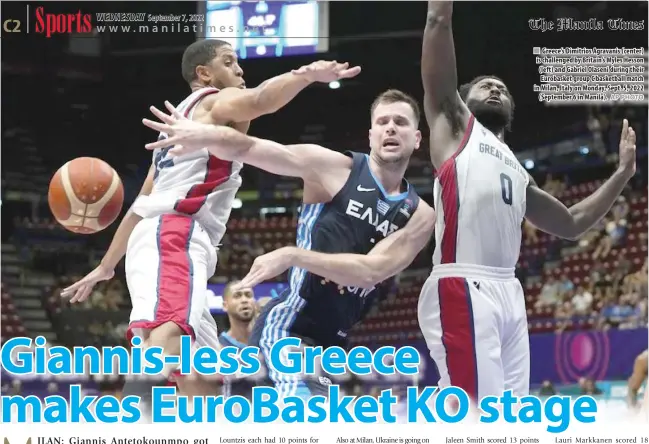  ?? AP PHOTO ?? ■ Greece’s Dimitrios Agravanis (center) is challenged by Britain’s Myles Hesson (left) and Gabriel Olaseni during their Eurobasket group C basketball match in Milan, Italy on Monday, Sept. 5, 2022 (September 6 in Manila).