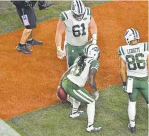  ?? David Richard, The Associated Press ?? New York Jets running back Isaiah Crowell celebrates in an unusual way after scoring a touchdown Sept. 20 against the Cleveland Browns.