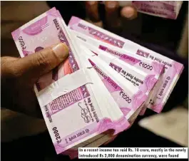  ??  ?? In a recent income tax raid Rs. 10 crore, mostly in the newly introduced Rs 2,000 denominati­on currency, were found