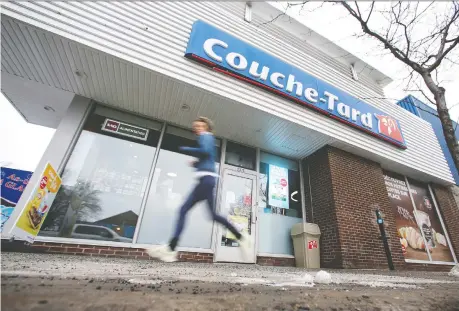  ?? CHRISTINNE MUSCHI/REUTERS ?? A French government official says France will carefully examine Canadian convenienc­e store giant Couche-tard's proposed takeover of Carrefour, given Carrefour's historical roots in France, the number of jobs involved and the turmoil in the retail industry.