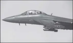  ?? SOUTH KOREA DEfENSE MINISTRy vIA AP ?? In this photo provided by South Korea Defense Ministry, a South Korean air force F-15K fighter jet flies with a Taurus missile during a drill off the country’s western coast yesterday.