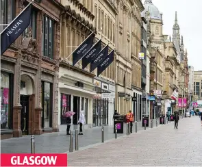  ??  ?? Silent and shuttered: One of the main shopping thoroughfa­res in Scootland’s biggest city, Buchanan Street, looks almost abandoned